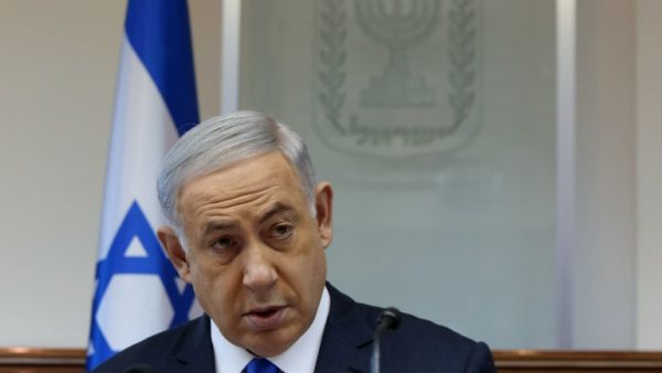 Israeli Prime Minister Benjamin Netanyahu opens the weekly cabinet meeting at his Jerusalem office on February 7, 2016. (AFP/Gali Tibbon)
