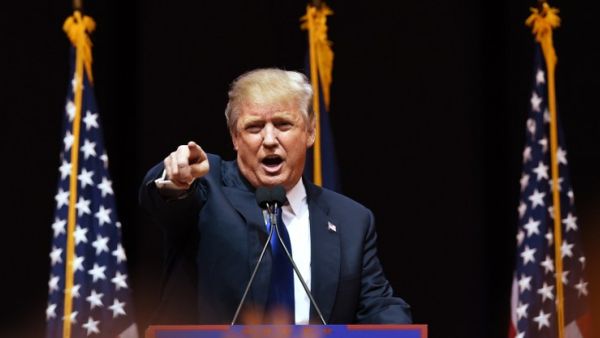 US Republican presidential hopeful Donald Trump speaks to the crowd during a rally February 8, 2016 in Manchester, NH. (AFP/Don Emmert)