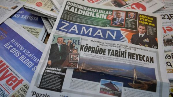 A photo taken in Ankara on March 6, 2016 shows the front page of the first new edition of the Turkish daily newspaper Zaman, which had staunchly opposed the president, now with articles supporting the government since its seizure by authorities. (AFP/Adem Altan) A photo taken in Ankara on March 6, 2016 shows the front page of the first new edition of the Turkish daily newspaper Zaman, which had staunchly opposed the president, now with articles supporting the government since its seizure by authorities. (AFP/Adem Altan)