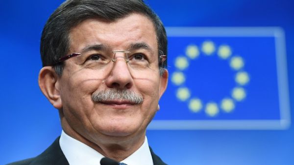 Turkey's Prime Minister Ahmet Davutoglu addresses a press conference at the end of an EU leaders summit with Turkey centered on the the migrants crisis, at the European Council, in Brussels on March 8, 2016. (AFP/Emmanuel Dunand)