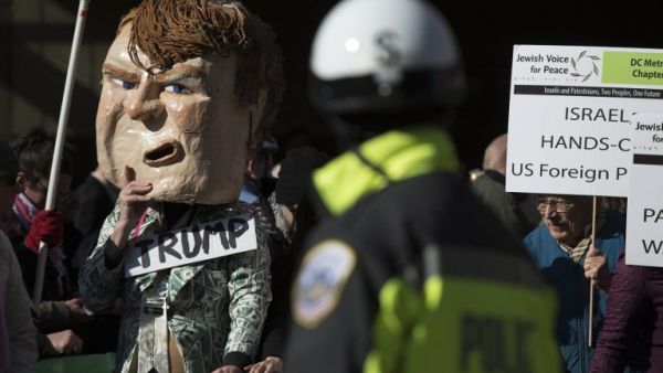 Protesters gather outside Verizon Center where Donald Trump and other presidential primary candidates are speaking during the AIPAC 2016 Policy Conference on March 21, 2016 in Washington, DC. (AFPMolly Riley)