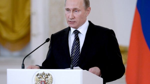 Russian President Vladimir Putin delivers a speech at a ceremony to present state awards to Russian military personnel who fought in Syria at the Kremlin in Moscow, on March 17, 2016. (AFP/Alexei Nikolsky)
