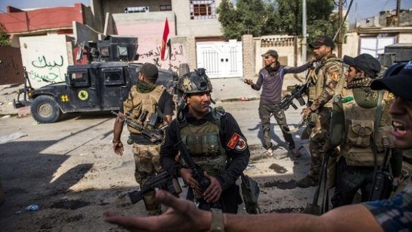  Iraqi Special Forces on a raid (AFP/File Photo)	