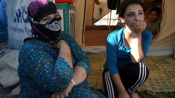 Thousands of Syrian women continue to languish in prisons in regime-controlled areas (AFP/File Photo)