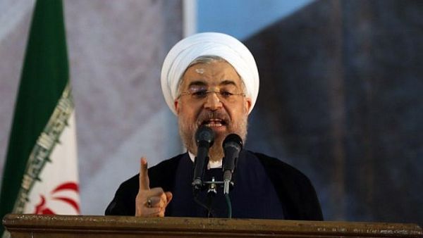 Iranian President Hassan Rouhani delivers a speech in Tehran. (photo credit: AFP/ATTA KENARE)