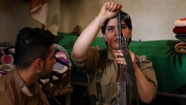 Iranian Kurdish Peshmerga members of the Iranian Kurdistan Democratic Party (KDP-Iran) clean their weapons during routine military exercise in Koya, 100 kms north of Arbil, the capital of the autonomous Kurdish region of northern Iraq, on August 23, 2017. (AFP)