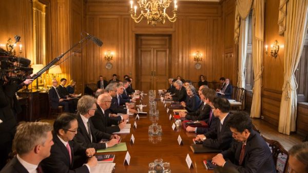 Britain's Prime Minister Theresa May (6R) hosts a roundtable with Japanese investors in the UK at 10 Downing Street in central London on Feb. 8, 2018 hosted by Britain's Prime Minister Theresa May. 
(Daniel LEAL-OLIVAS / AFP)