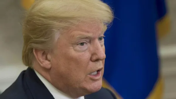 US President Donald Trump speaks to the press in the Oval Office of the White House in Washington, DC, Feb. 9, 2018. 
(SAUL LOEB / AFP)