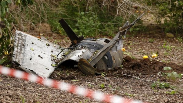 A picture taken on Feb. 10, 2018, shows the remains of a missile that crashed earlier in Alonei Abba, east of Haifa, in northern Israel. Israel struck a dozen Syrian and Iranian targets inside Syria in "large-scale" raids after an Israeli fighter jet crashed under fire from Syrian air defences in a severe increase in tensions, the military said.
(Jack GUEZ / AFP)