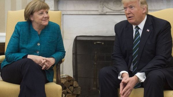 US President Donald Trump and German Chancellor Angela Merkel (AFP/File Photo)	
