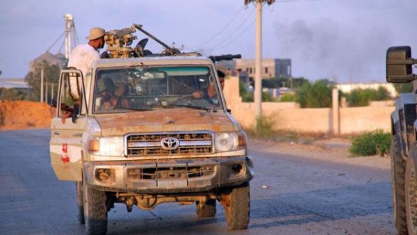 Forces loyal to the Government of National Accord patrol a street during renewed clashes in the south of the Libyan capital Tripoli. (AFP)