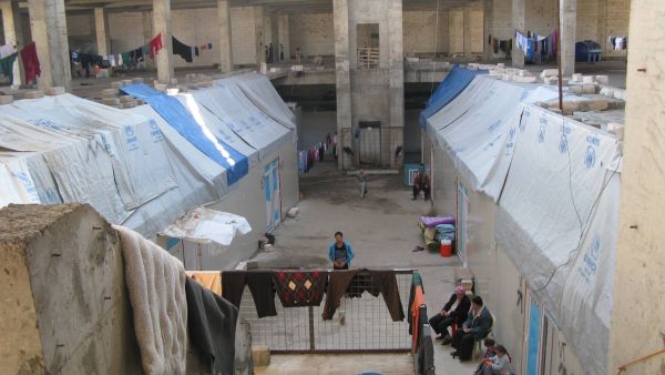 Christian refugees who fled Daesh living in the abandoned construction site of a mall in Erbil, Kurdistan. (Facebook) 