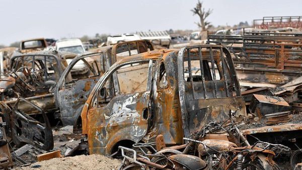This picture taken on March 24, 2019 shows destroyed vehicles in the village of Baghouz in Syria's eastern Deir Ezzor province near the Iraqi border, a day after the Islamic State group's 'caliphate' was declared defeated by the US-backed Kurdish-led Syrian Democratic Forces (AFP)
