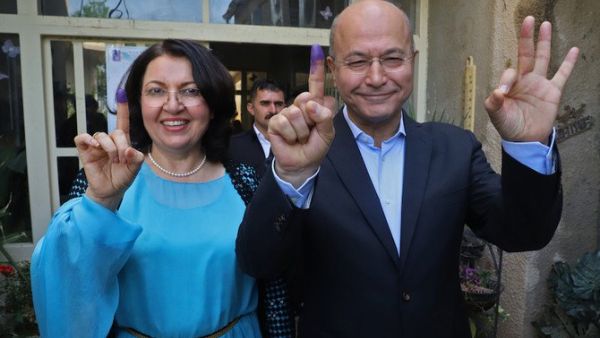 Barham Salih and his wife, during the May election. Salih has been nominated by the PUK to be the next president of Iraq. (AFP/File)