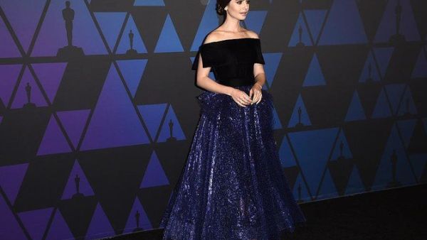 Lily Collins wore a gown by Georges Chakra. (Source: AFP)