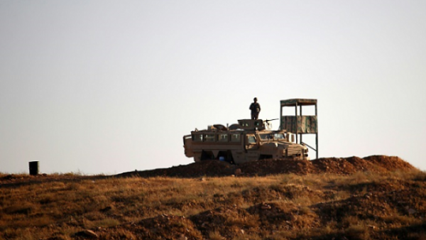 Jordanian soldiers control the border between Syria and Jordan, near the town of Nasib. (AFP/File)