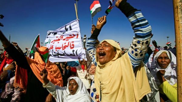 Supporters of Sudanese President Omar al-Bashir shout slogans during a rally in Khartoum. (AFP/ File)