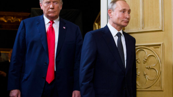 U.S. President Donald Trump and Russian President Vladimir Putin arrive for a meeting in Helsinki, on July 16, 2018. (AFP/Getty Images/ Brendan Smialowski) 