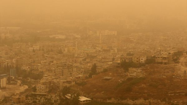 The unseasonal storm has caused two deaths so far in Lebanon, as hundreds more from across the Levant are sent to the hospital over breathing problems. (AFP/File)
