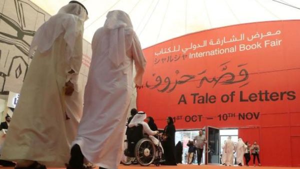 Saudis attend the Sharjah International Book Fair in Sharjah, northeast of Dubai, on October 31, 2018. - The fair will be held between October 31 and November 10, 2018. (KARIM SAHIB / AFP)
