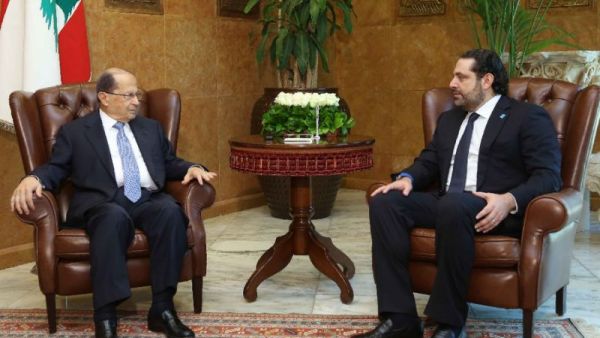 Lebanese President Michel Aoun (left) meets with his new Prime Minister Saad Hariri at the presidential palace in Baabda, east of Beirut. (AFP/HO)

