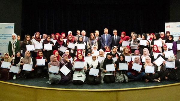 Graduates of a women’s vocational training programme pose for a photo with their certificates on Thursday (Photo courtesy of UN Women)