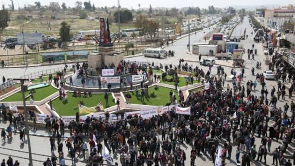 People gather at Arab Army Square in Zarqa (Facebook)