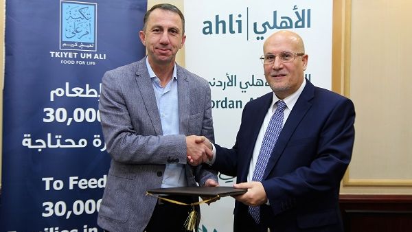 الدكتور احمد الحسين المدير العام للبنك الأهلي و سامر بلقر المدير العام لتكية أم علي سامر بلقر