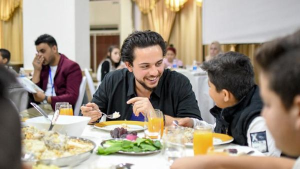 HRH Crown Prince Hussein joins orphans for an Iftar meal in Amman on Wednesday (Photo courtesy of Royal Court)