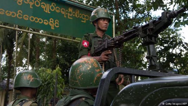 Myanmar soldiers stand guard in Maungdaw in Myanmar's northern Rakhine state (AFP/File Photo)	