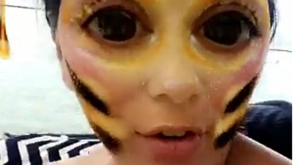 Baby buzz: Eva Longoria showed off her baby bump while dressed in an orange two-piece bathing suit on Saturday (Source: Eva Longoria - Snapchat)