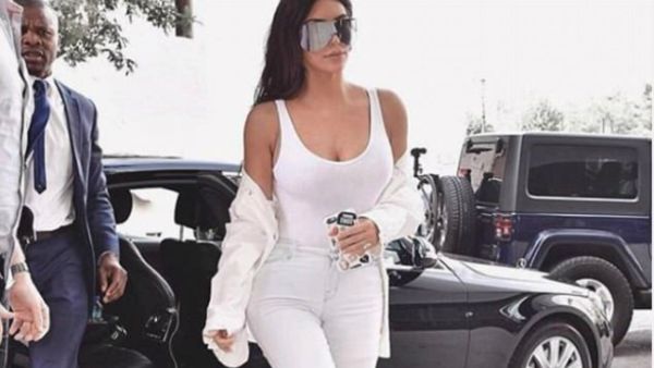 Pounding the pavement: Kim Kardashian was back at it on Monday, posting an Instagram snapshot in which she modeled a slightly sheer white tank top (Source: Kim Kardashian - Instagram)
