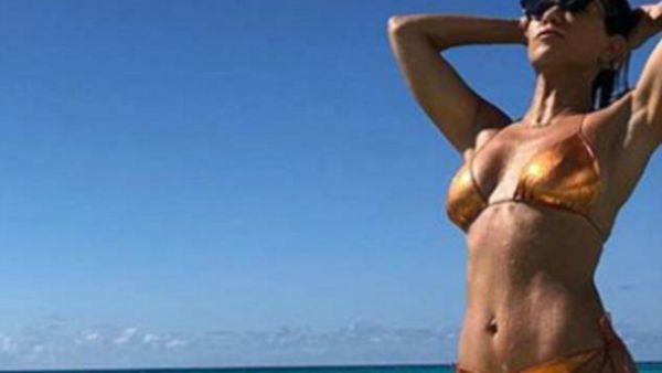 Hottie alert: Kourtney Kardashian shared this sexy bikini snap as she calls herself Sporty Spice while on vacation in the Turks and Caicos on Monday (Source: Kourtney Kardashian - Instagram)