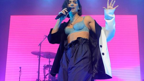 Sing it! As her fourth headlining tour hit the Olympia Theatre in Dublin on Monday night, Dua Lipa wowed in a barely-there ensemble for the energetic performance (Source: REX - Shutterstock)