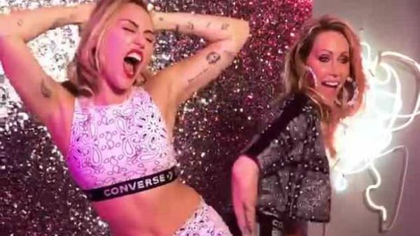 Woah mama! Miley Cyrus and mom Tish got a little naughty for Mother's Day as the Hannah Montana persona twerked while her mom playfully spanked her backside (Source: Miley Cyrus - Instagram)