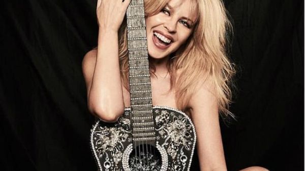 Birthday suit: Kylie Minogue marked her 50th birthday on Monday, uploading a risque naked picture on her Instagram account a few minutes after midnight (Source: Kylie Minogue - Instagram)