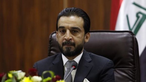 Newly elected parliament speaker Mohammed al-Halbousi heads a meeting at the local government headquarters in Basra on September 18, 2018. (AFP/File)