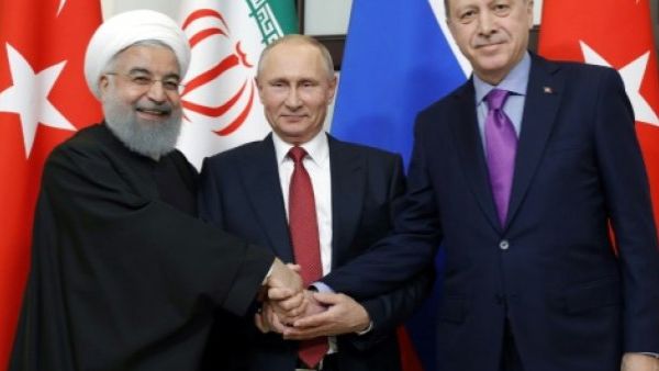 Best of Friends: Rouhani, (L), Putin (C) and Erdogan prepare to talk politics on Syria in Ankara meeting, Wednesday  (AFP/File Photo)	