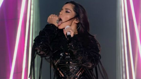 Racy: During one particularly seductive move, the singer licked her hand (Source: ITV)