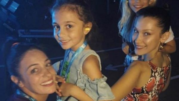 Family: Bella Hadid couldn't help but gush over her 'beautiful' family while taking them to see her beau the Weeknd perform in their hometown of Dubai on Friday (Source: bella hadid - Instagram)