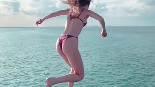 Weeee! Victoria's Secret catwalker Gigi Hadid got wet and wild while yachting in Miami on Sunday (Source: gigihadid - Instagram)