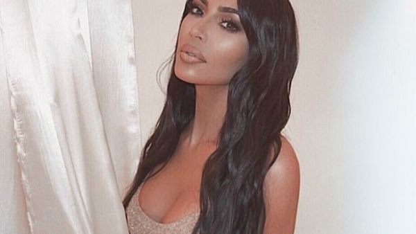 'Golden girl': Kim Kardashian oozes sex appeal in a new Instagram snap she shared on Sunday night (Kim Kardashian - Instagram)