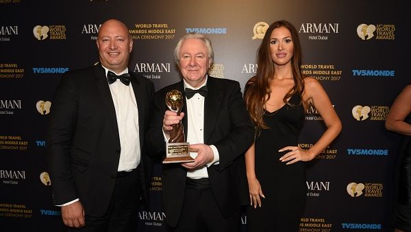 Chadi Gedeon General Manager of Mövenpick Hotel Beirut receiving the Lebanon s Leading Luxury Hotel Award from Mr Graham Cooke President Founder World Travel Awards