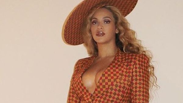 Beyonce shared a selection of busty snaps of herself in a geometric print suit ahead of her evening out (Instagram)