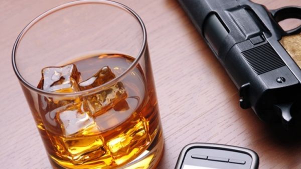 Alcohol and guns are a bad combination. (Shutterstock)