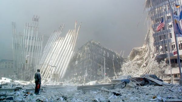 A man stands amid the rubble of NYC's World Trade Center days after the September 11 attacks in 2001. (AFP/Doug Kanter)