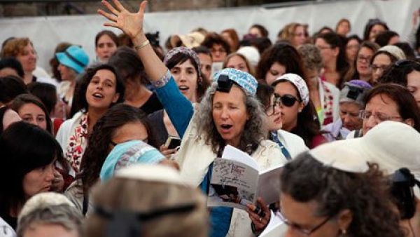 A member of Women of the Wall wears phylacteries and the 'tallit' shawl, traditional Jewish prayer apparel for men. (AFP/Gali Tibbon)