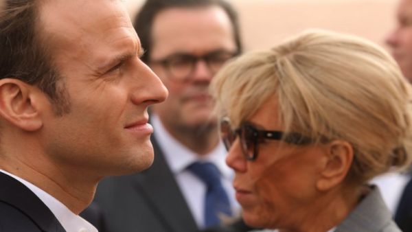 French President Emmanuel Macron (L) and his wife Brigitte  (AFP)