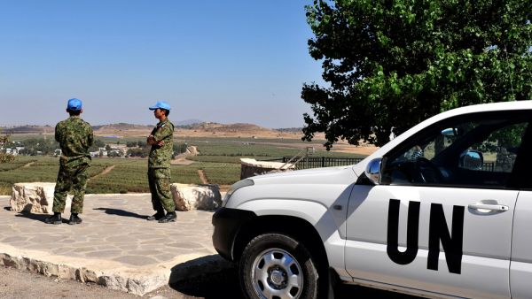 UNDOF soldiers examine the Israeli-Syrian border (Shutterstock)