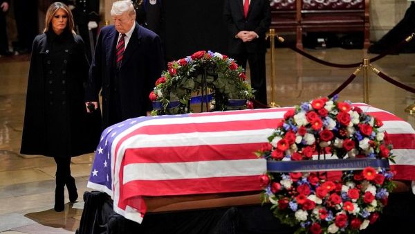 The Trumps paying final respects (AFP)